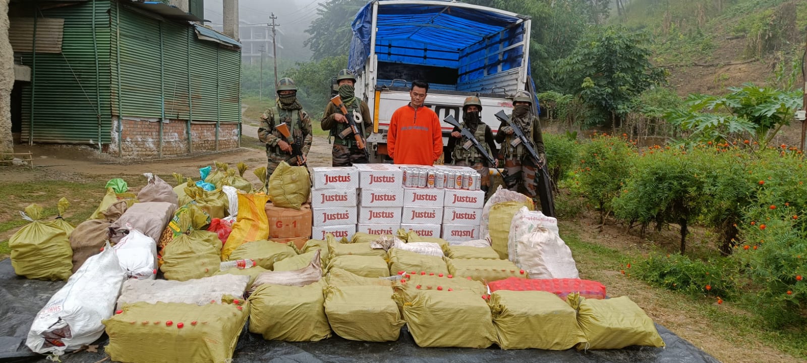 Security forces confiscate contraband liquor in Churachandpur district