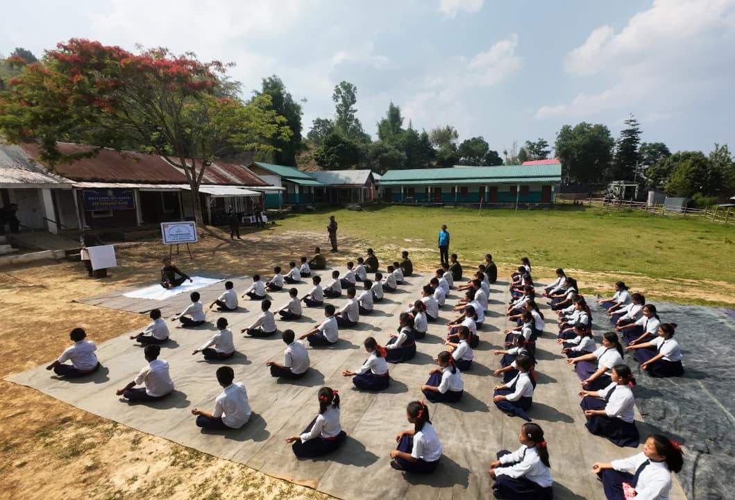 60 students, 14 teachers join Assam Rifles yoga session at MB Saichang school